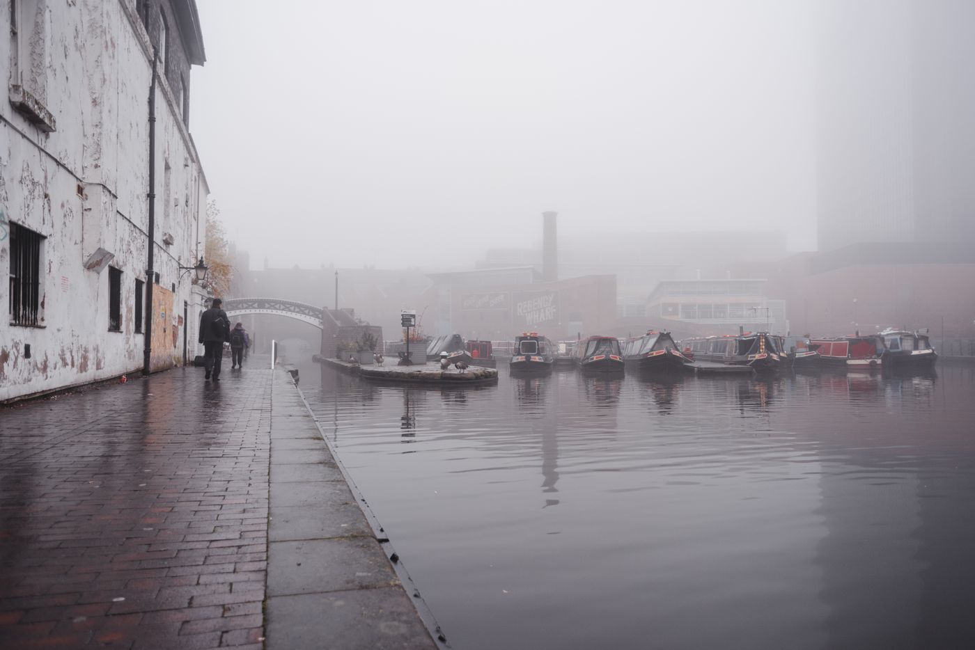 Boats moored along a canal