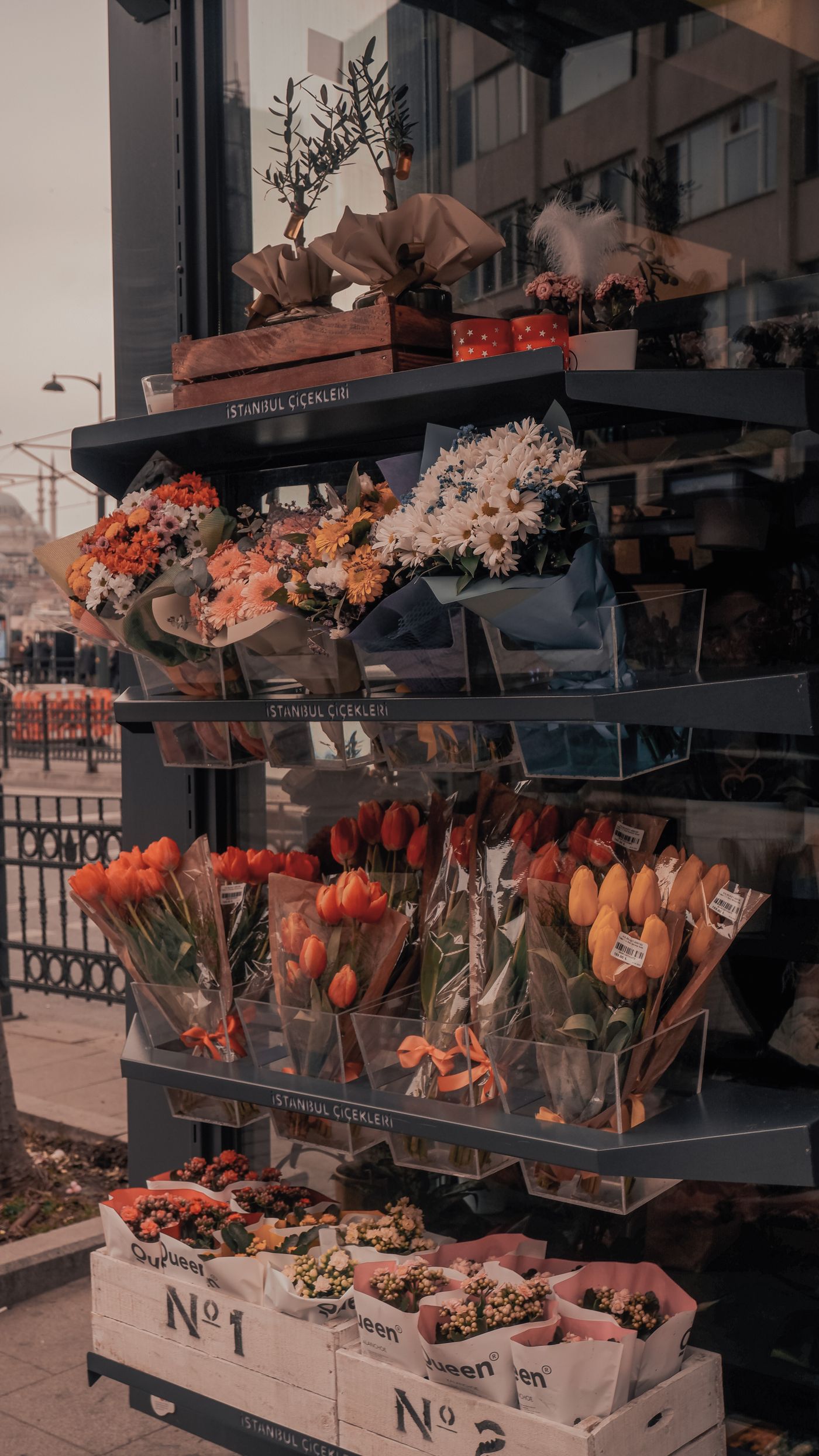 Flower bouquets displayed on shelves