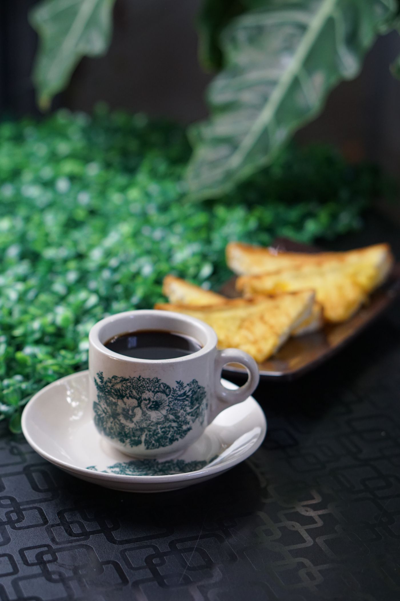 Coffee and toast served at a table