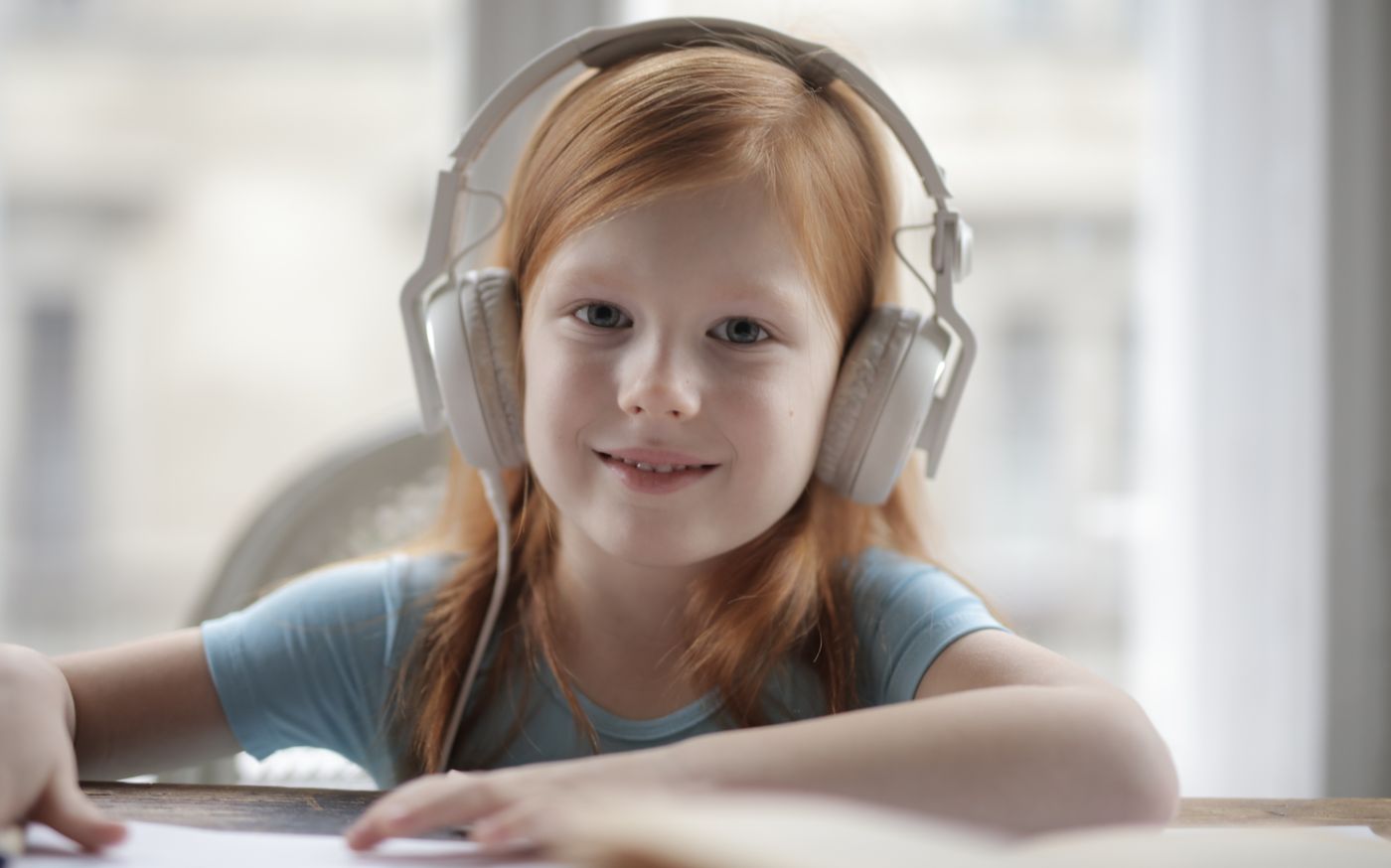 A person listening to music with headphones